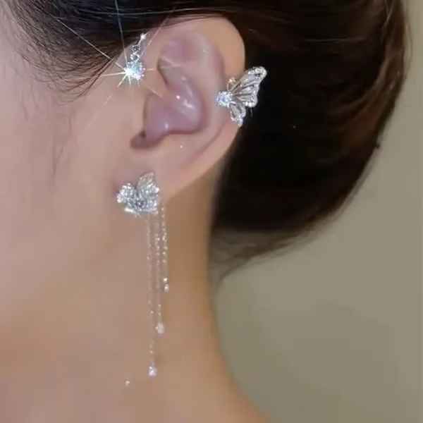 Boucles d'oreilles pendantes papillon à pompon et zircon