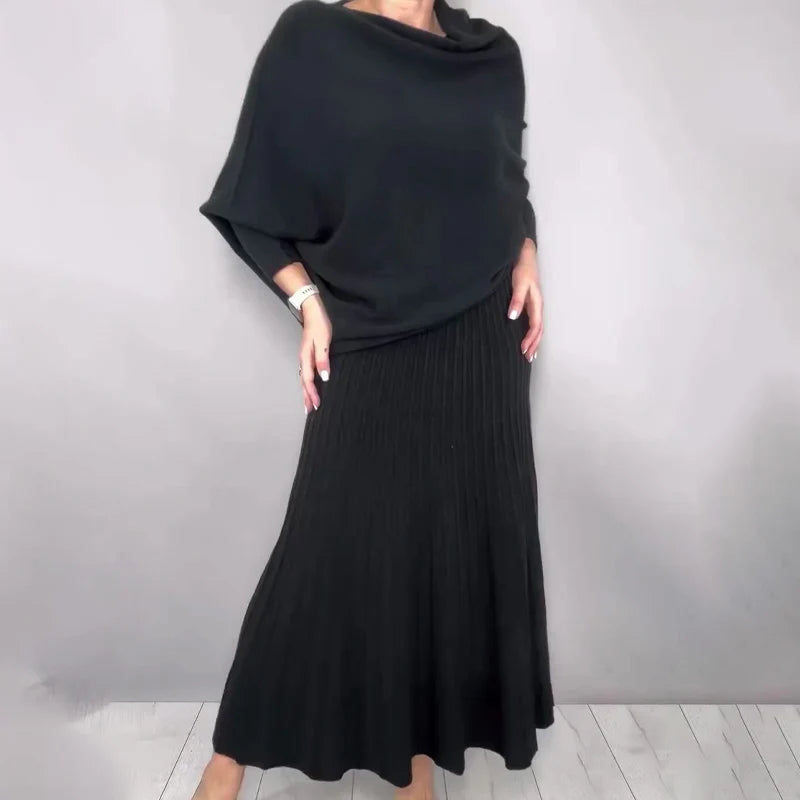 Ensemble composé d'un haut en tricot à col roulé et d'une jupe longue plissée évasée pour femme
